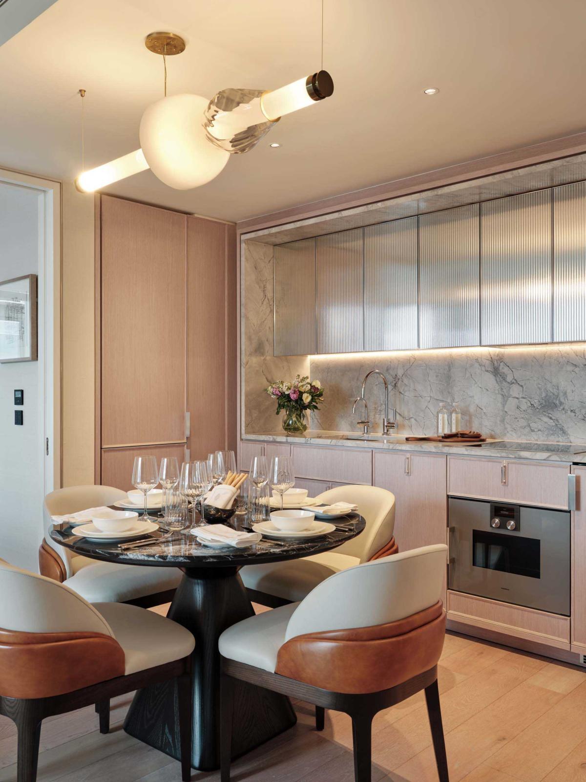 Bespoke Luna chandelier highlighting dining area