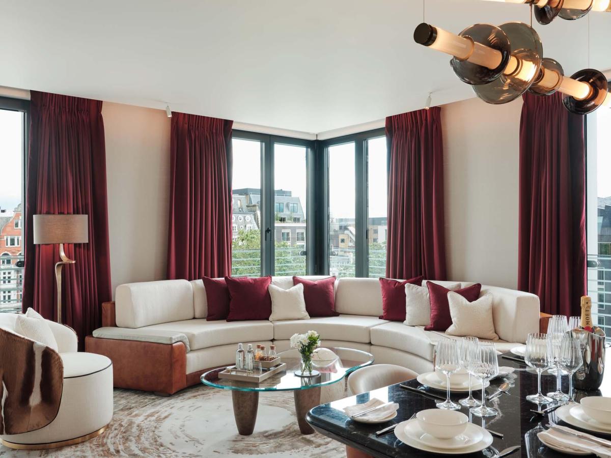 Bespoke linear chandelier with suspended glass elements