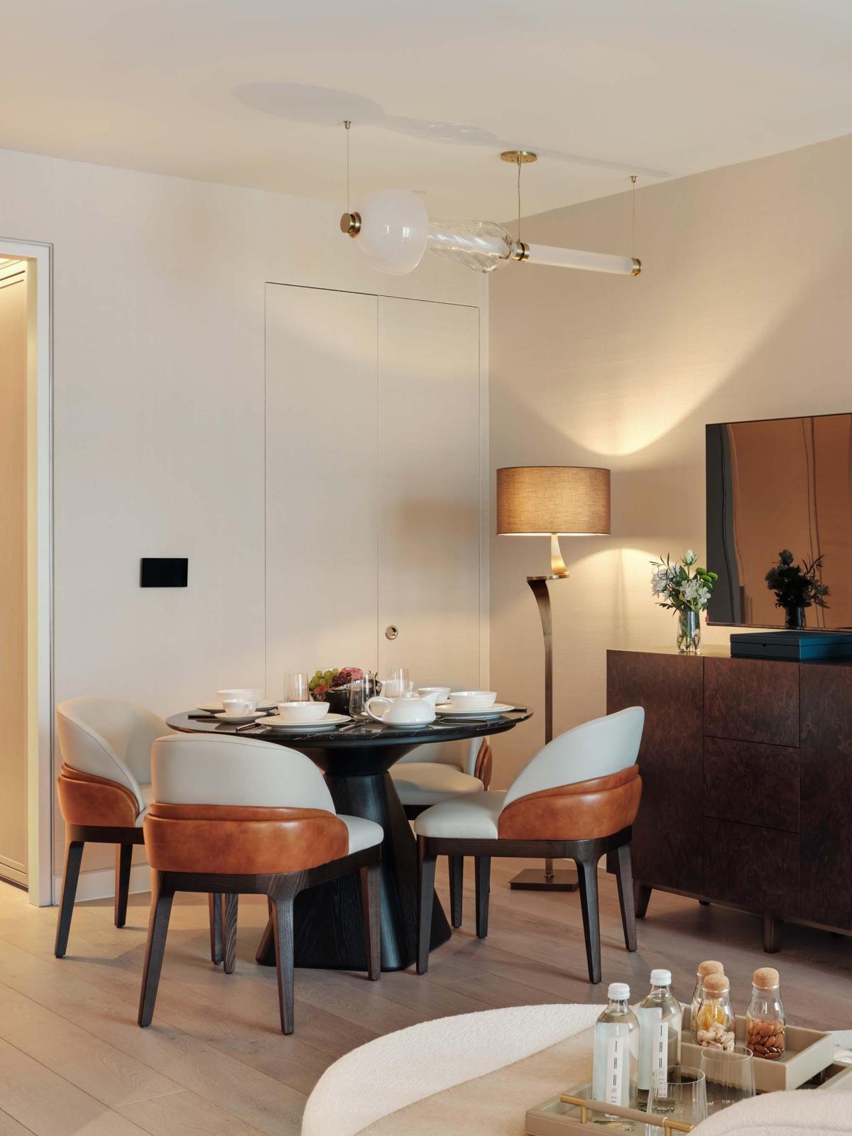 Luxury glass chandelier design in modern Mayfair residence dining space