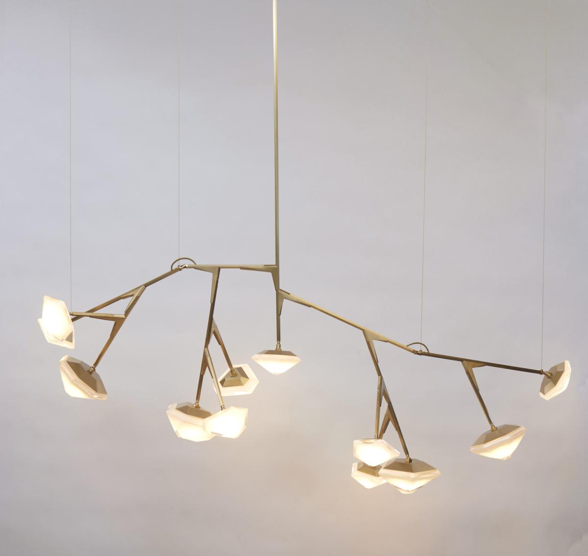 Gabriel Scott Myriad long chandelier with sleek brass arms and custom double-blown glass orbs, shown as a standalone product.